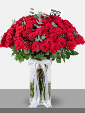 RED ROSES IN VASE - l