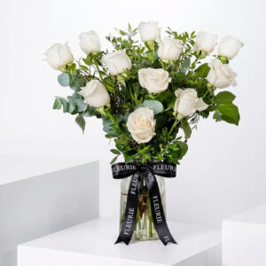 white roses in vase - s